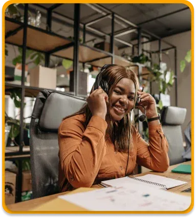 Smiling contact centre agent wearing a headset