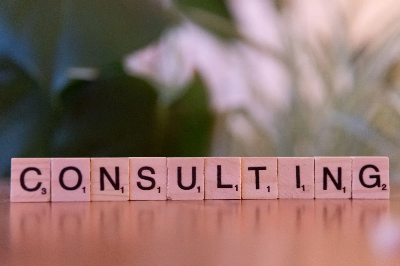 Wooden letter tiles spelling the word consulting